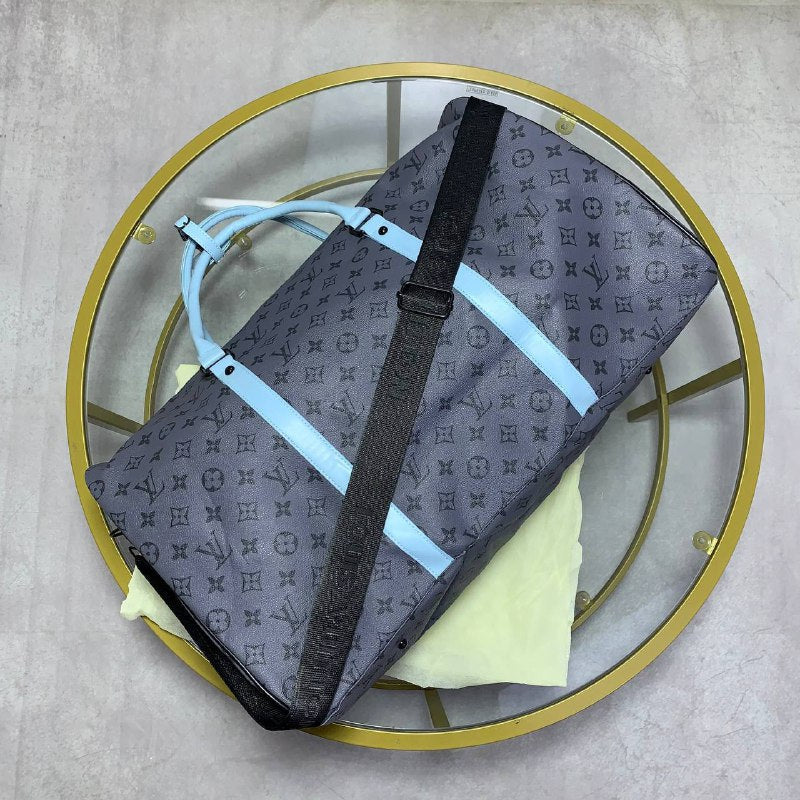 Louis Vuitton Keepall Bandouliere 55 - Monogram Eclipse Reverse with Turquoise Leather Trim UK Reps AAA Quality