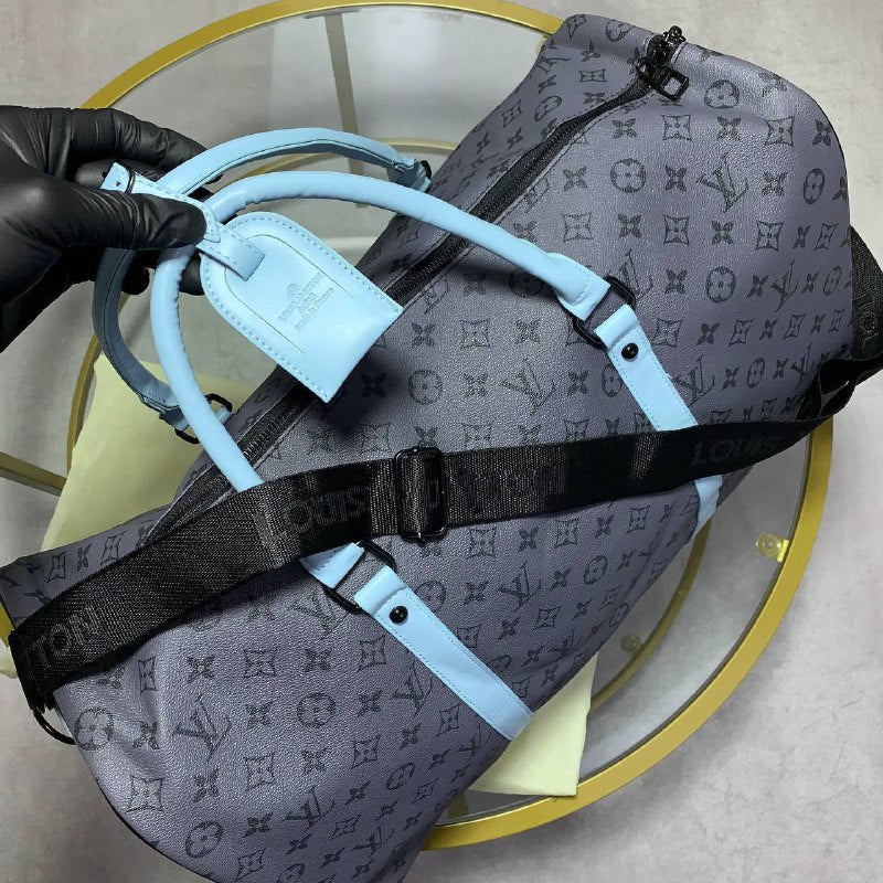 Louis Vuitton Keepall Bandouliere 55 - Monogram Eclipse Reverse with Turquoise Leather Trim UK Reps AAA Quality