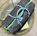 Louis Vuitton Keepall Bandouliere 55 - Monogram Eclipse Reverse with Turquoise Leather Trim UK Reps AAA Quality